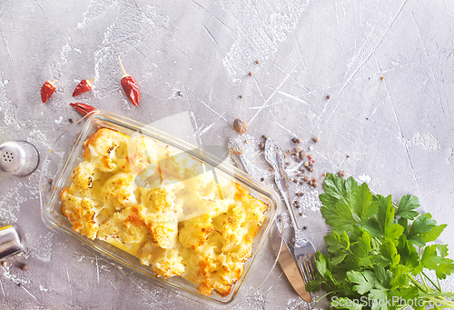 Image of Cauliflower cheese in a baking dish on a table