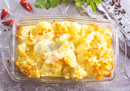 Image of Cauliflower cheese in a baking dish on a table