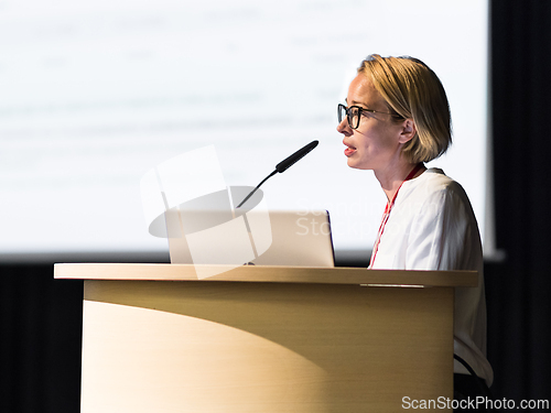 Image of Female speaker giving a talk on corporate business conference. Business and Entrepreneurship event.