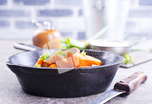 Image of Homemade Organic Orange Roasted Carrots with Garlic and Parsley
