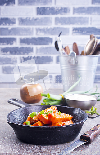 Image of Homemade Organic Orange Roasted Carrots with Garlic and Parsley