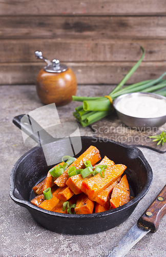 Image of Homemade Organic Orange Roasted Carrots with Garlic and Parsley
