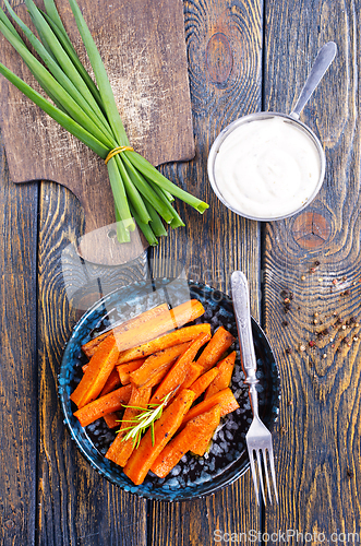 Image of Homemade Organic Orange Roasted Carrots with Garlic and Parsley