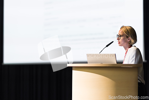 Image of Female speaker giving a talk on corporate business conference. Business and Entrepreneurship event.