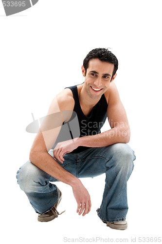 Image of Handsome guy squatting