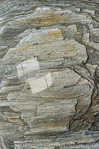 Image of Textured gray stone surface showcasing natural patterns and geol
