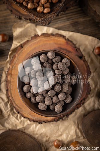 Image of Roasted hazelnuts covered with chocolate