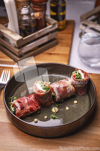 Image of Prosciutto rolls with salad filling