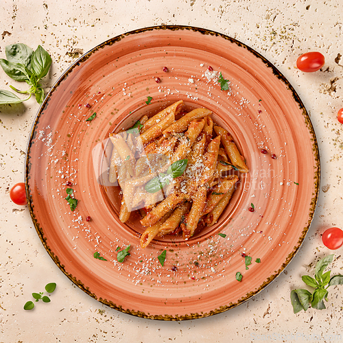 Image of Delicious penne pasta with tomato sauce