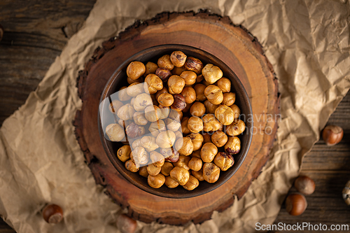 Image of Shelled hazelnuts filling a bowl