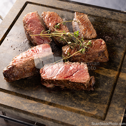 Image of Close up of juicy grilled steaks