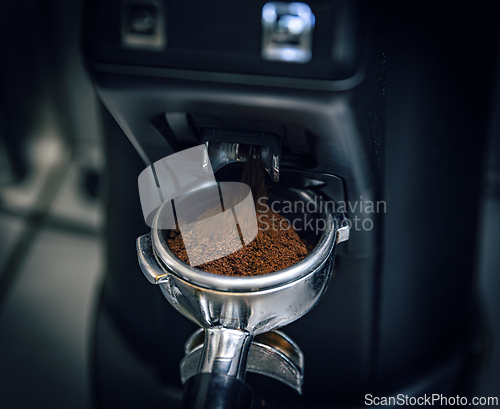 Image of Coffee machine grinding coffee beans