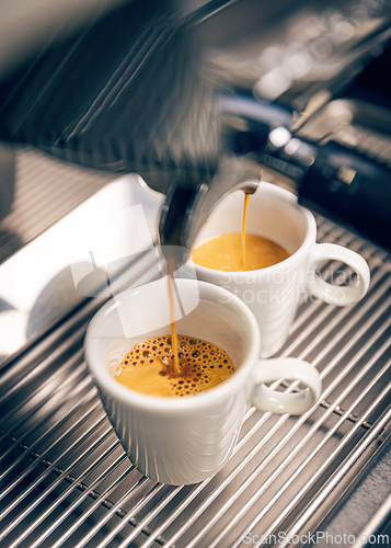 Image of Coffee machine pouring espresso