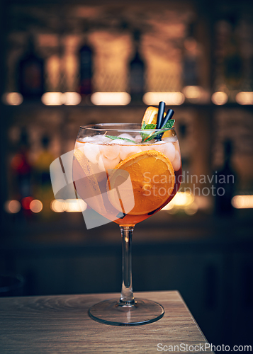Image of Orange cocktail with ice and mint