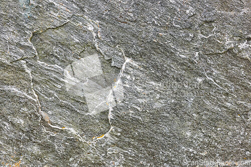 Image of Textured surface of natural stone showcasing intricate patterns 