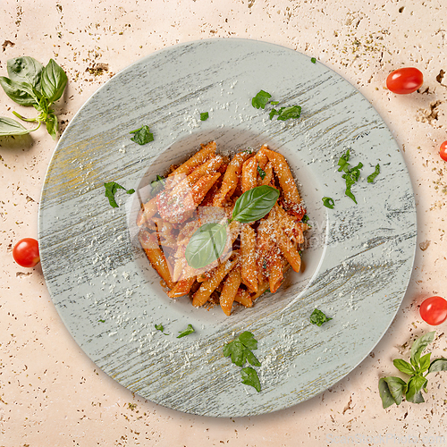Image of Penne pasta with tomato sauce