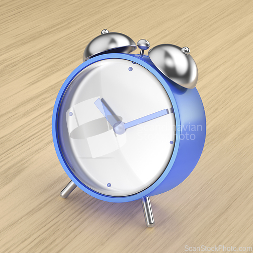 Image of Blue analog alarm clock