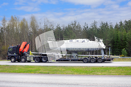 Image of Truck Transports Large Sailboat 