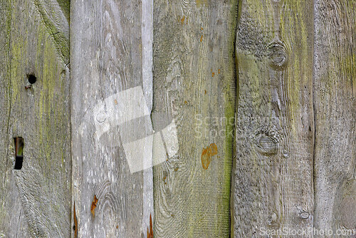 Image of Textured wooden planks stacked closely together showcasing natur