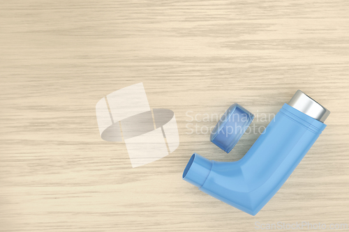 Image of Blue portable inhaler device