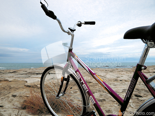 Image of Bicycle on the rocky coast of the sea.