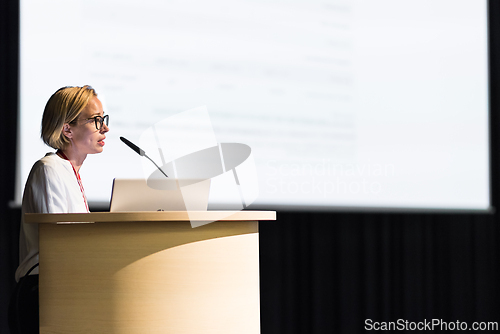 Image of Female speaker giving a talk on corporate business conference. Business and Entrepreneurship event.
