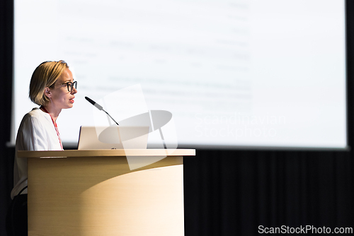 Image of Female speaker giving a talk on corporate business conference. Business and Entrepreneurship event.