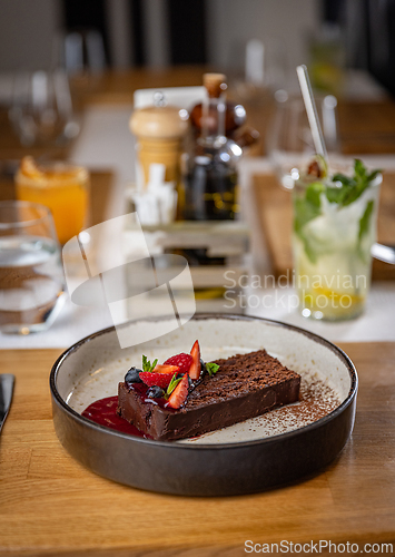 Image of Chocolate cake with fresh berries