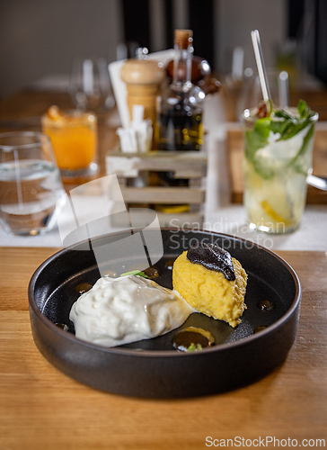 Image of Creamy polenta with burrata cheese