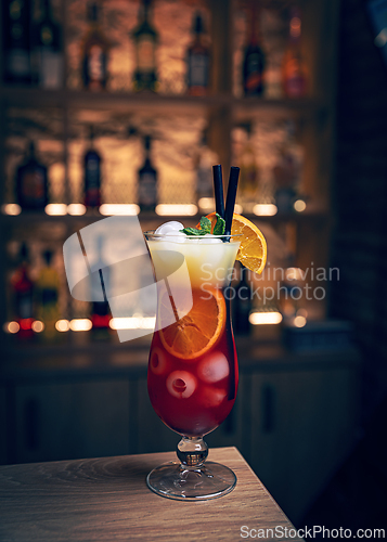 Image of Refreshing cocktail garnished with mint and orange slices