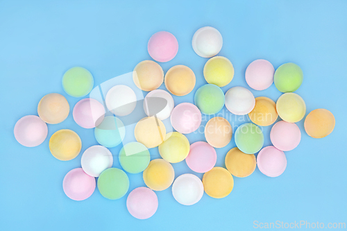 Image of Flying Saucer UFO Shaped Sweets Abstract Background 