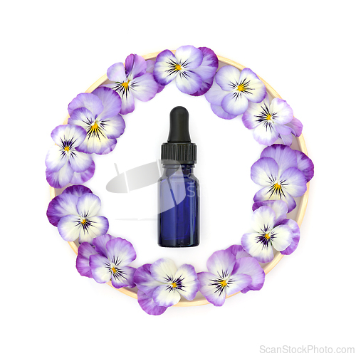Image of Pansy Flower Wreath and Aromatherapy Essential Oil Bottle