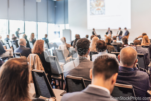Image of Interview and round table discussion at business convention and presentation. Audience at the conference hall. Business and entrepreneurship symposium
