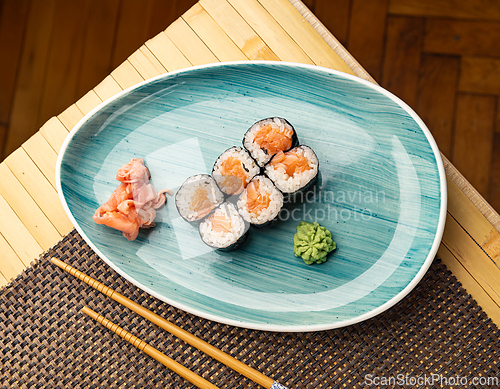 Image of Fresh hosomaki rolls, filled with salmon
