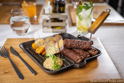 Image of Romanian mici, traditional skinless sausages