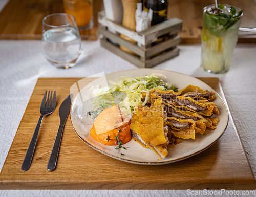 Image of Golden brown breaded cutlet