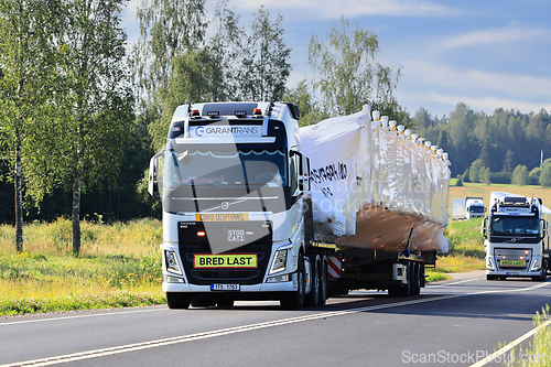 Image of Two Volvo FH Oversize Load Transports on Highway