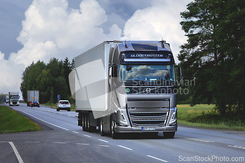 Image of Silver Volvo FH Truck Semi Trailer on Road