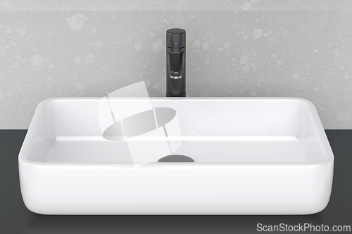 Image of Modern bathroom sink and faucet
