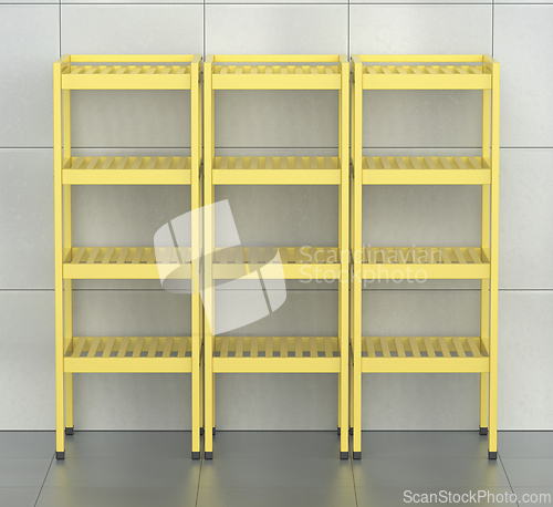 Image of Yellow metal shelving units 