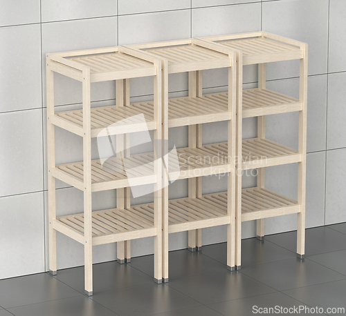 Image of Empty wooden shelving units