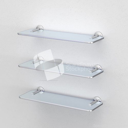Image of Three empty glass shelves