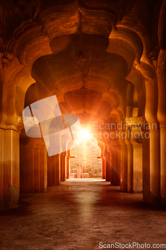 Image of Old ruined arch in ancient palace at sunset