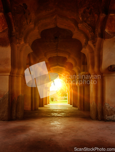 Image of Old ruined arch in ancient palace at sunset