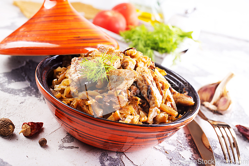 Image of stew cabbage with fried meat