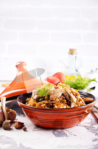 Image of stew cabbage with fried meat