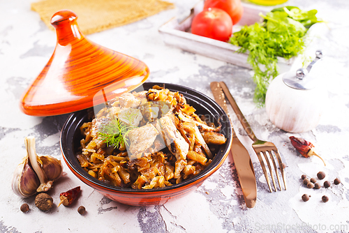 Image of stew cabbage with fried meat