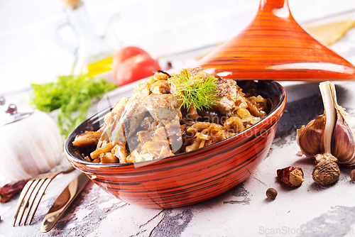 Image of stew cabbage with fried meat