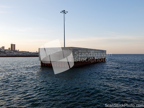 Image of Concrete pier at sea.