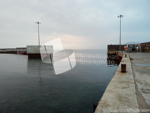 Image of Concrete pier at sea.
